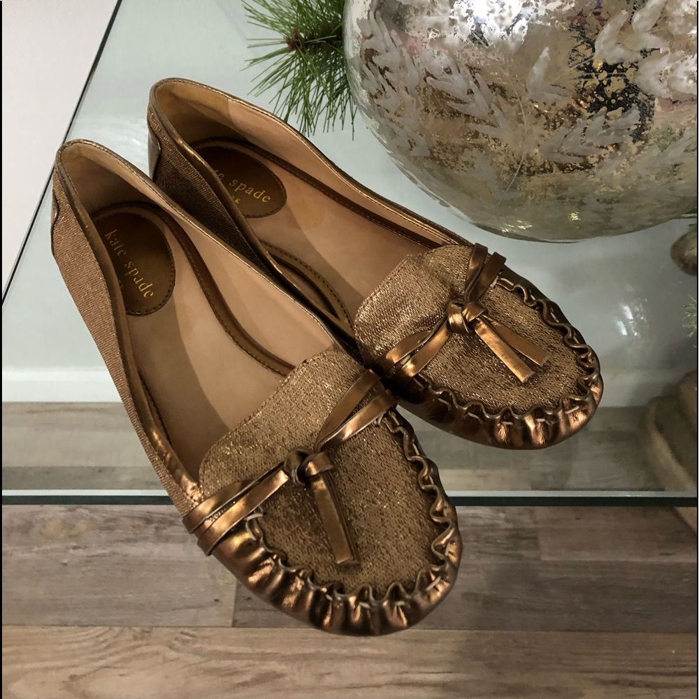 Kate Spade gold loafers in excellent condition. Beautiful gold shade.